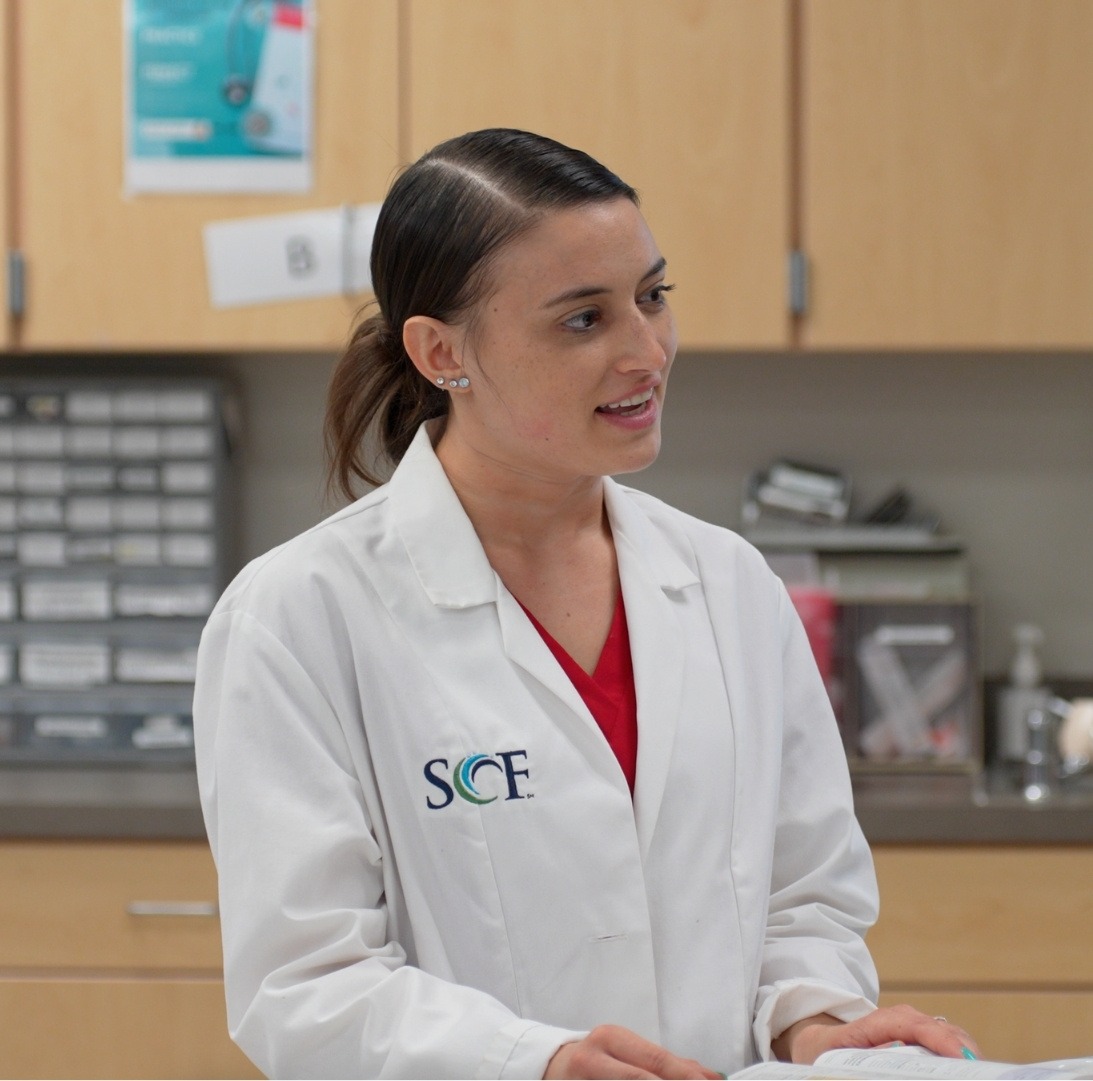 nursing student wearing SCF labcoat