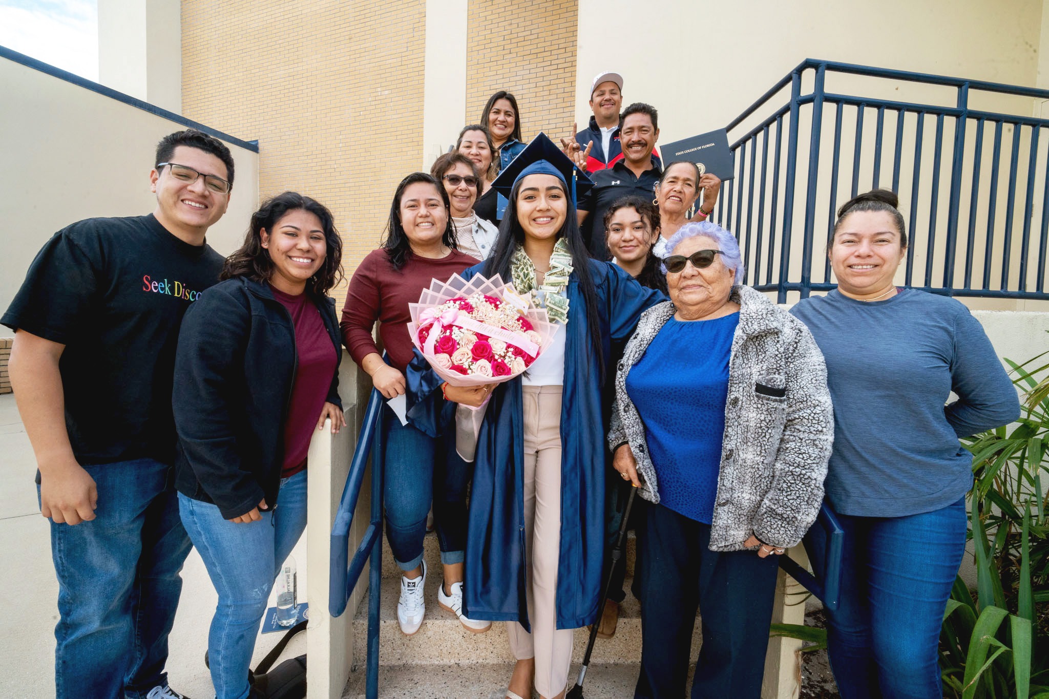 SCF Winter 2024 Graduate and family.